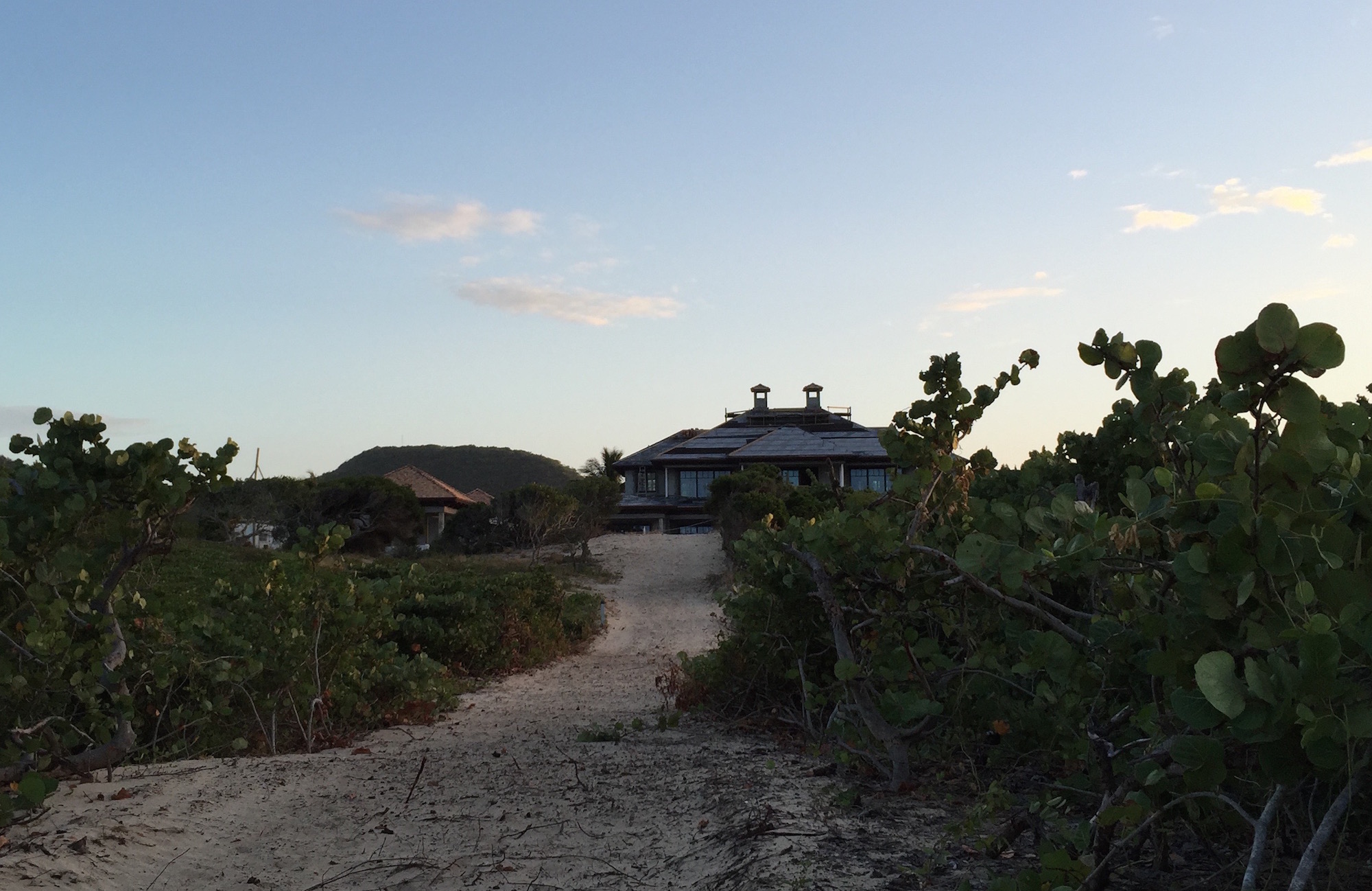 Exterior view St. Kitts project by MMA , as seen from the beach's sandy dunes.